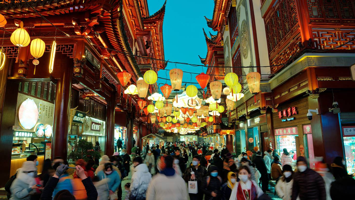 Lunar New Year celebrations with lanterns lining streets.
