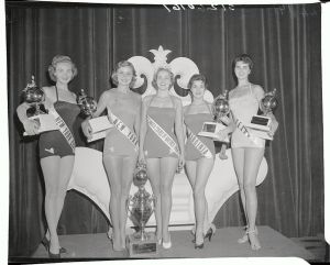 (Original Caption) Proudly showing their trophies are the winners in Wednesday night's judging of the "Miss U.S.A." division of the "Miss Universe" contest. Left to right: Miss New York City, Rene Roy, Fourth Place; Miss New York, Karen Huitman, third place; Miss South Carolina, Mirian Stevenson, "Miss U.S.A."; Miss Virginia, Ellen Whitehead, second place; and Miss Texas, Betty Lee, fifth place. The South Carolina belle last night won the "Miss Universe" crown to win the third annual beauty pageant at Long Beach.