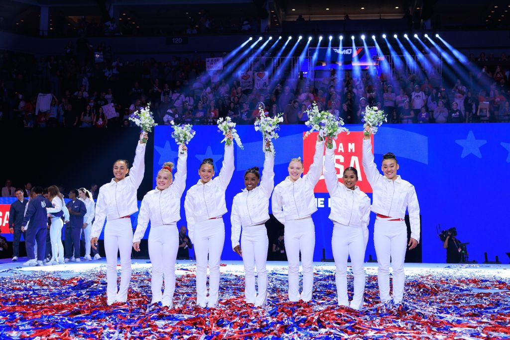 MINNEAPOLIS, UNITED STATES - JUNE 30: (Left to right) Hezly Rivera, Joscelyn Roberson (alternate), Suni Lee, Simone Biles, Jade Carey, Jordan Chiles, and Leanne Wong (alternate) celebrate after being named at the U.S. Olympic Team for women's gymnastics at Target Center in Minneapolis, United States on June 30, 2024. (Photo by Nikolas Liepins/Anadolu via Getty Images)